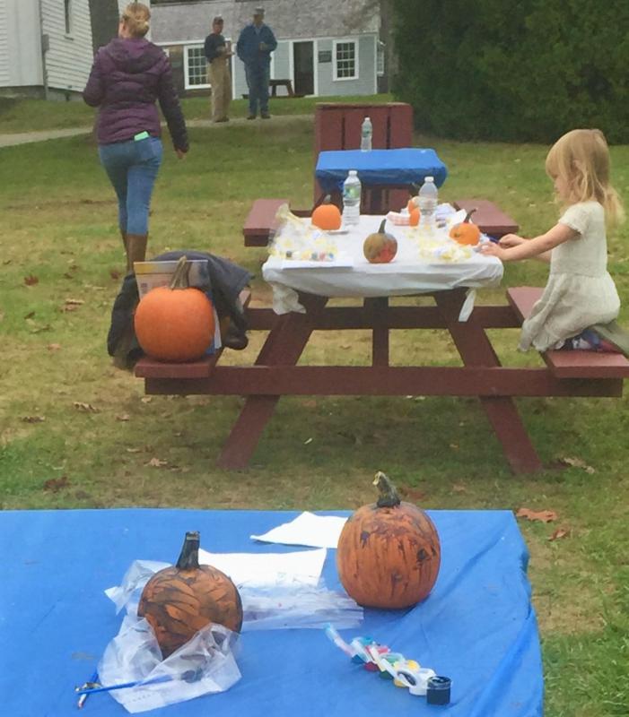 A young artist and her round, orange, organic palette. LISA KRISTOFF/Boothbay Register
