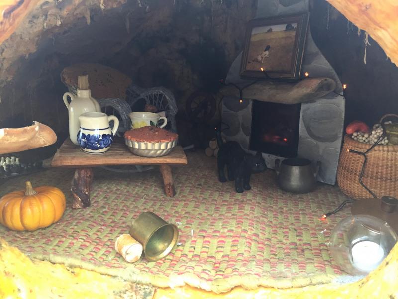 Inside the hobbit house, there’s even a framed print of Andrew Wyeth’s “Christina’s World” and a fireplace!