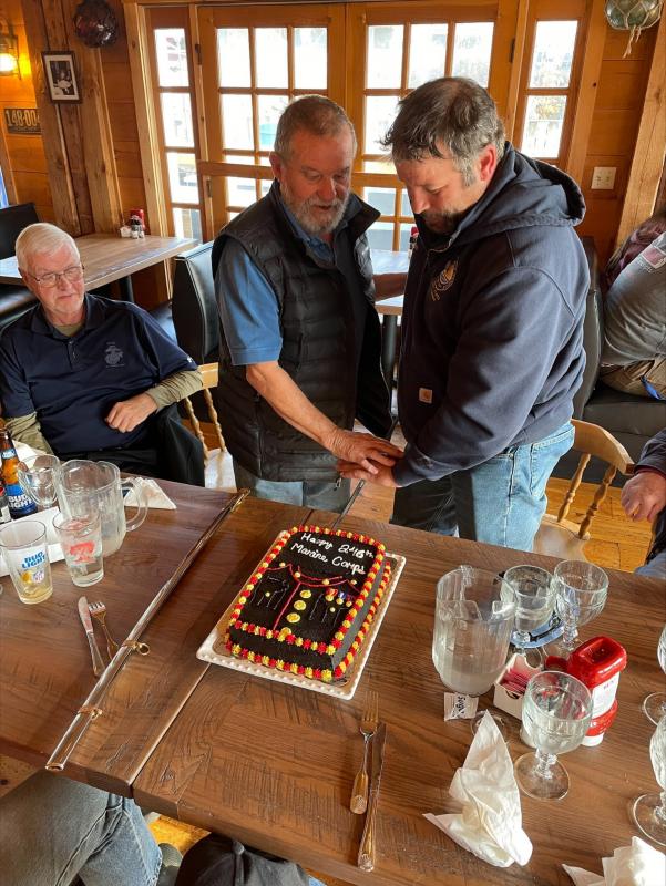 The tradition of cutting the Marine Corps birthday cake by the youngest and the oldest serving members with their service sword was done by John Webster and Nick Upham. Jen Mitchell photo