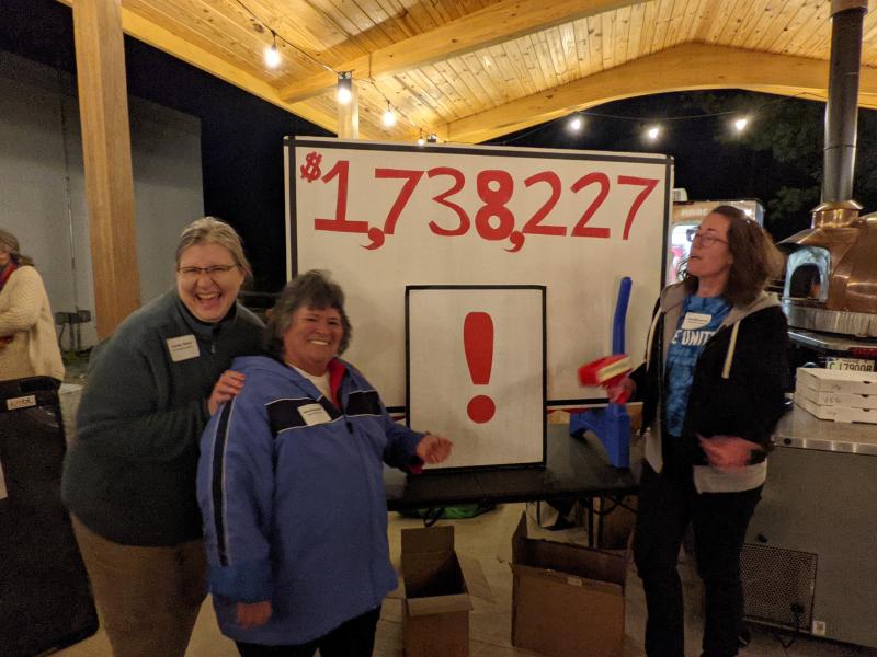 United Way Loaned Executives Denise White, left, Nina Bergendoff, and Tara McCannell of L.L. Bean, right, display the Campaign results: $1,738,227! The goal was $1,725,000. The projected totals include residential gifts anticipated to come in before the end of the calendar year. Courtesy of Barbara Reinertsen