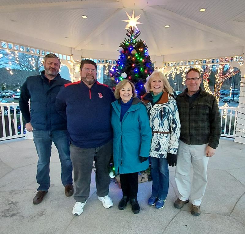 Boothbay Civic Association honors Estelle Appel Dec. 9 with a Christmas tree in her memory. From left are Town Manager Dan Bryer, Selectman Chuck Cunningham, BCA member Dawn Gilbert, Appel’s daughter Judy Appel White and BCA member Lincoln Erhard. Andrea Lowery photo