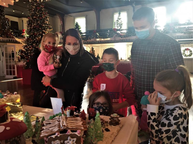 The Light family of Bangor also came to see Santa at Boothbay Railway Village and take in Gardens Aglow on Sunday. From left, Greta, Aimiee, Judah, Veda, Joe and Marina. LISA KRISTOFF/Boothbay Register