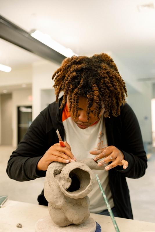 Artist Gerald Brown works on a piece during The Color Network’s 2021 Watershed residency. Courtesy of Claire Brassil