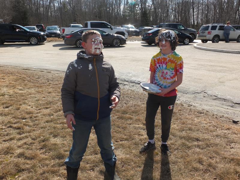 Edgecomb sixth graders Jackson Zehm, left, and Ethan Clark won the right to put a pie in the faces of their math teacher Nicole Ellis and Principal Dr. Christina Boursaw on International Pi Day. But the two decided to put a pie in their own face on March 14. BILL PEARSON/Boothbay Register