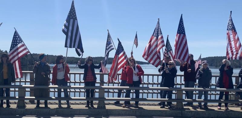 Numerous motorists crossing the Donald E. Davey Bridge honked their horns celebrating a Patriots’ Day March by local patriots. BILL PEARSON/Boothbay Register