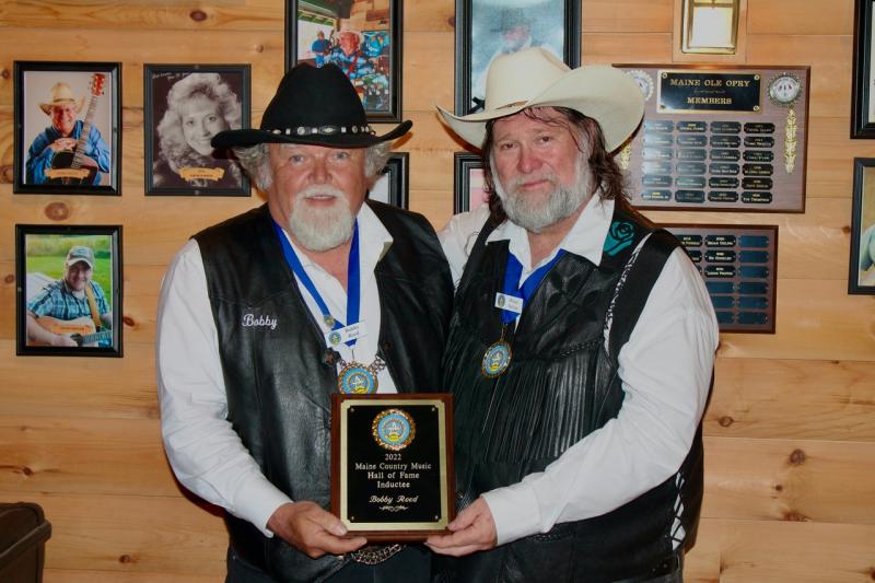 Brian Gelina and Bobby Reed with plaque. Courtesy of Brittany Reed