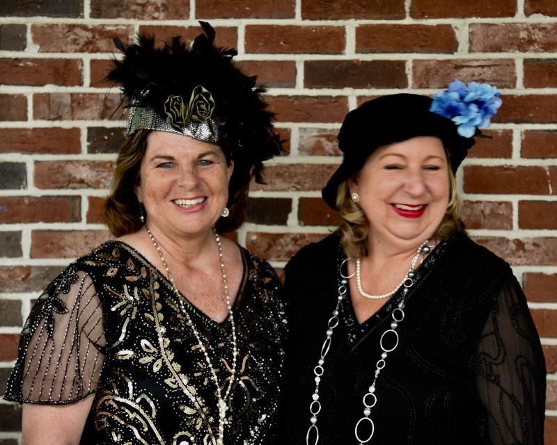 Sister flappers Kerrin Erhard and Mindy LeBrecque look for the dance floor. Bob Crink photo