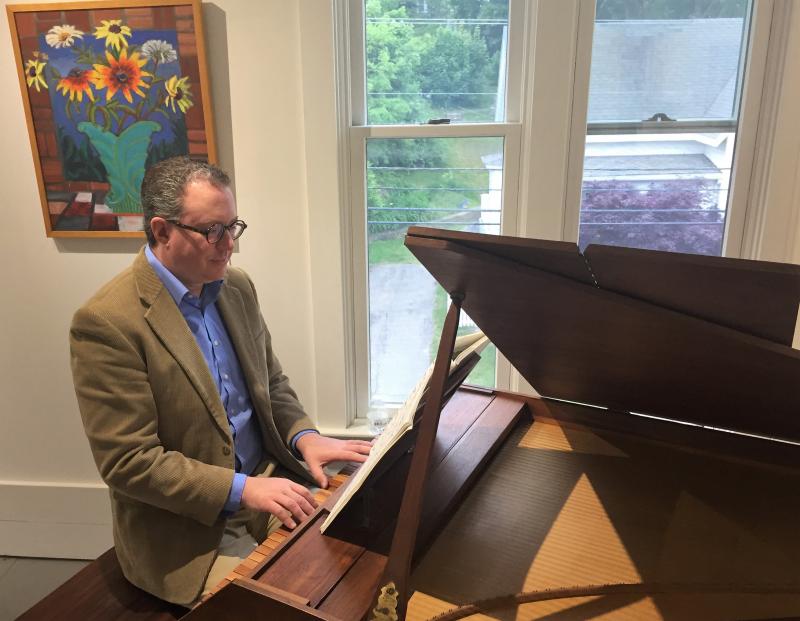 Aaron Robinson returned to the harpsichord at Studio 53 for the first First Friday. LISA KRISTOFF/Boothbay Register Aaron Robinson