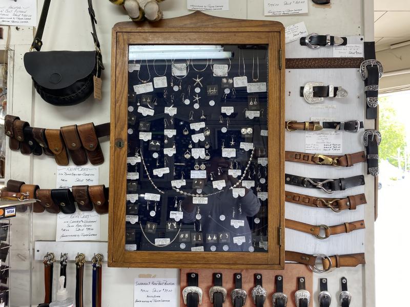 A wall case displays some of Dombrowski’s silver jewelry. ISABELLE CURTIS/Boothbay Register
