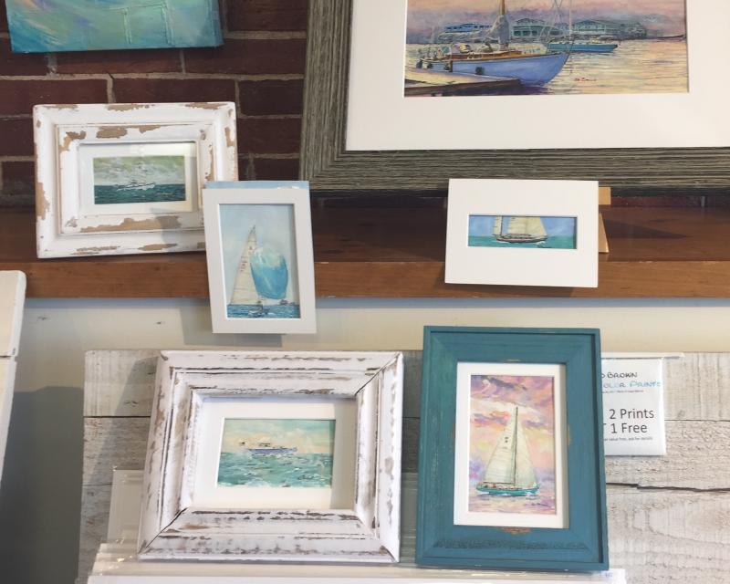 The small sailboat series by Ed Brown at his Wharfside Gallery on Commercial Street.