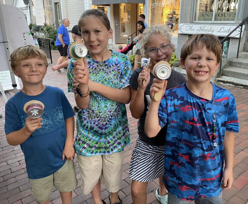 Young visitors to the Wiscasset Art Walk Aug. 25 made their own rattles at the Partners in Education tent. Wiscasset Art Walk photo