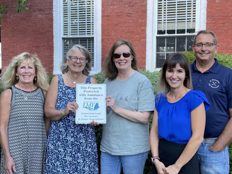 Pictured from left are Kathy Vise, BRMF secretary; Deanne Tibbetts, BRMF president; Laura Graham, senior planner LMF; Melissa Holmes Whitt Esq., Whitt Law, and George Friant, BRMF vice president. Photo taken in front of Whitt Law. Courtesy photo