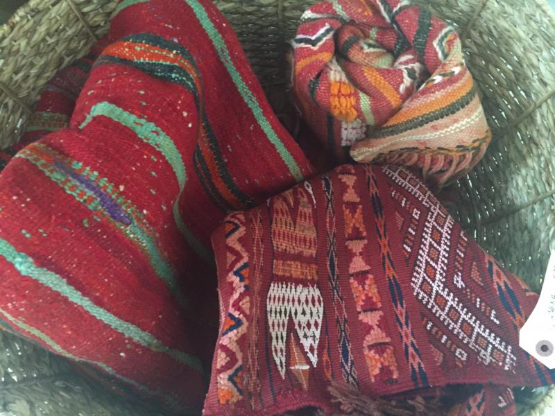 Moroccan rugs or wall hangings in a basket. LISA KRISTOFF/Boothbay Register. LISA KRISTOFF/Boothbay Register