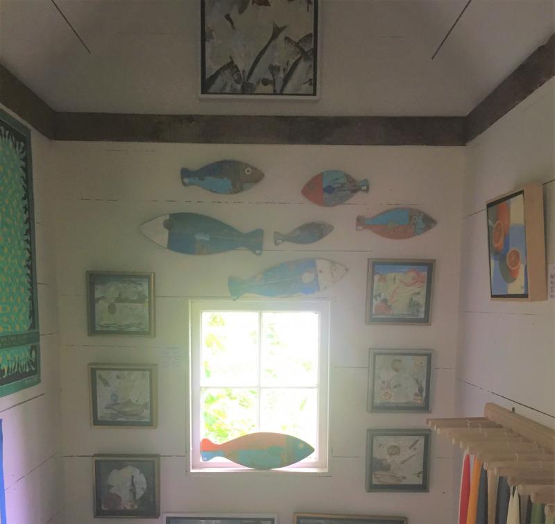 Small showroom features Kerr decoupage, candles, baboush, and colorful wooden fish made from Moroccan sardine fishing boats. LISA KRISTOFF/Boothbay Register