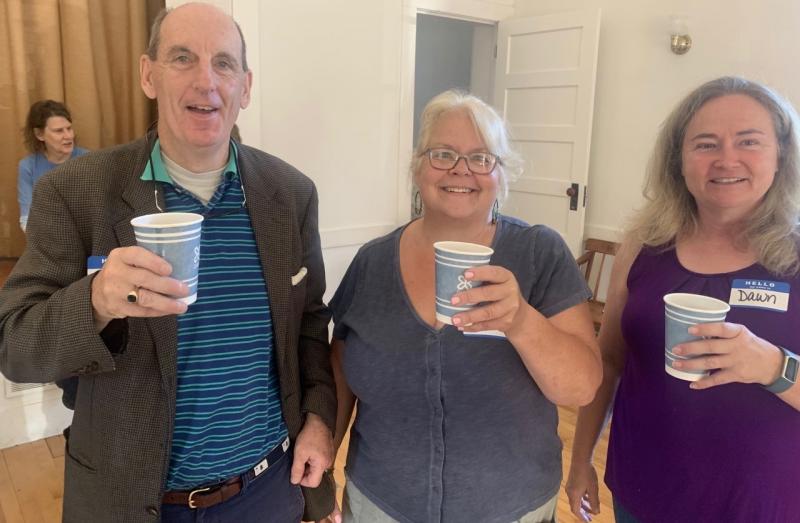 Edgecomb Selectman Dawn Murray, right, joins residents George Malone, left, and Deb Eaton in raising a coffee cheers to the town’s third “Meet and Greet,” held in the town hall on Aug. 19. BILL PEARSON/Boothbay Register