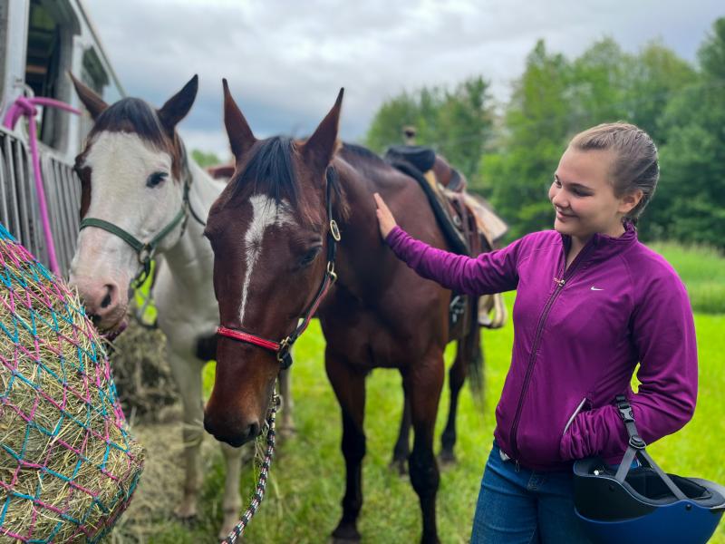 Angelina Puiia, 12, spends time with horses June 4, weeks before the stroke she continues to recover from. Courtesy of Samantha Crawford