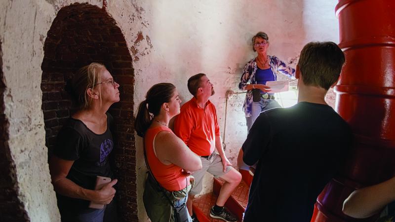 Photographers and tour guide in the Monhegan Lighthouse. Mike Leonard photo (www.phototourismbymike.com)