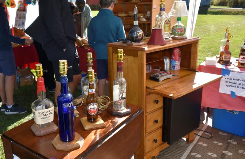 Duane Pinkham’s bottle lamps. LISA KRISTOFF/Boothbay Register