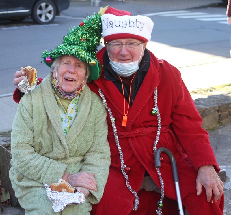 Howard and Dee Wright are always game for getting into the spirit of things. Here they are at last year’s Early Bird Sale. File photo