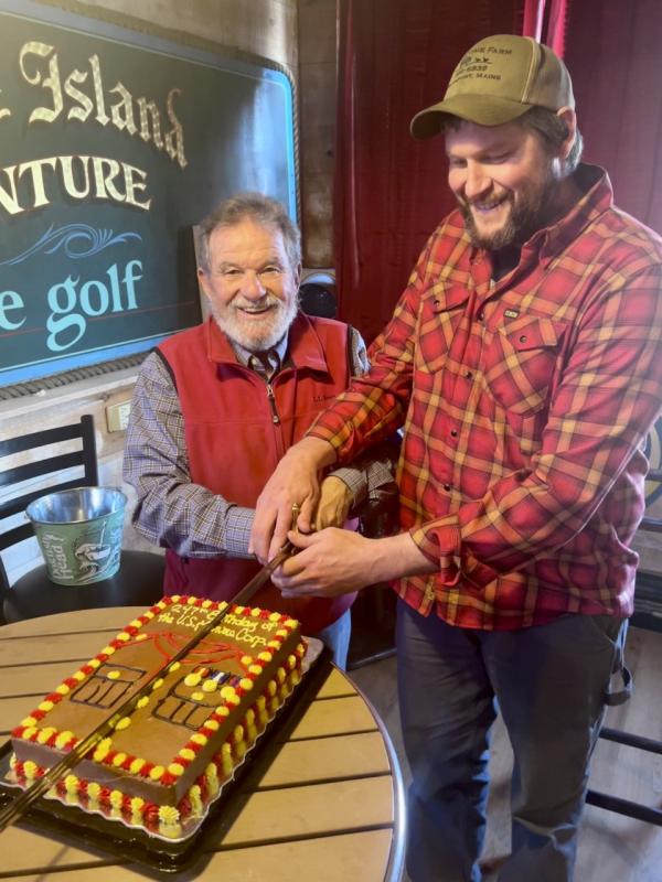 Cutting the U.S. Marine Corps cake were John Webster and Jack Sherman. Courtesy of Jim Singer