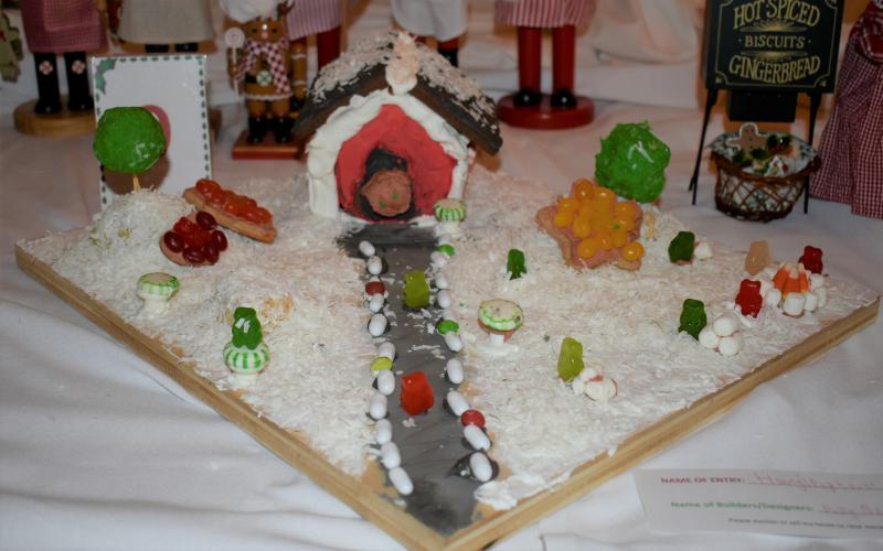“Honey’s Doghouse” by Polly Nadeau Miller.