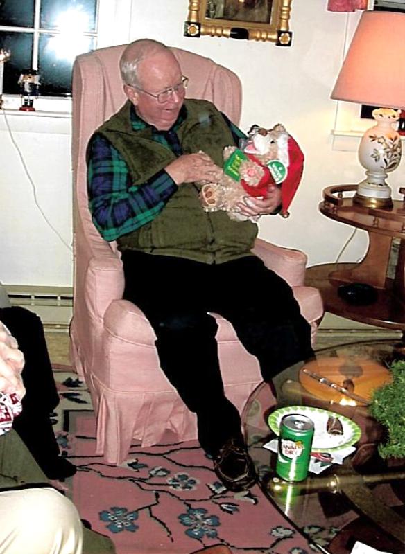 Coast Guard Auxiliary member, Dr. David Racicot, proudly shows his ultimate Yankee Swap! Howard Wright photo