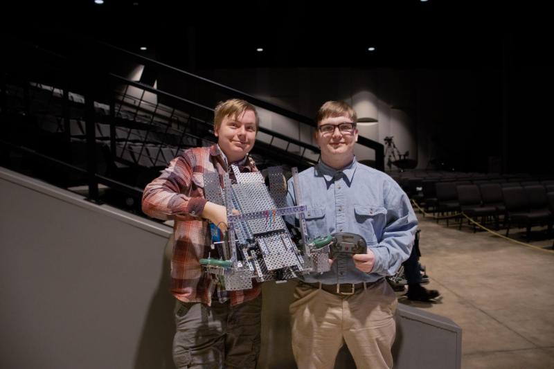 Afton Warren-Burdin, left, and Kolton Campbell display their 6th place finishing robot at the state championship. Sebastian Warren-Burdin photo