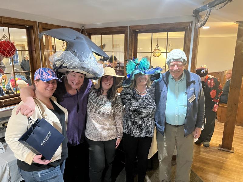 Best Hat winners, Kate Maringer (second from left) and Chip Teel (far right) posed for a Kodak moment with, from left, Dana Greenleaf, Evie Greenleaf and Stephanie Hawke. Patricia Royall photo