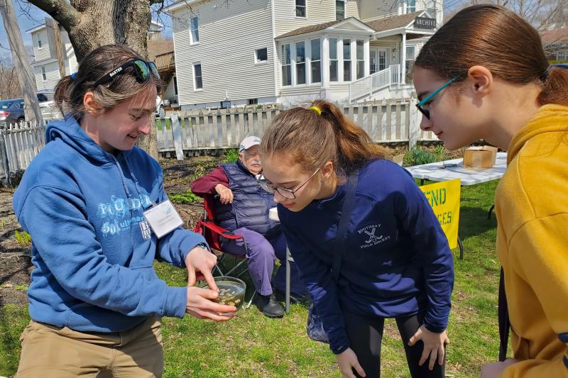 Bigelow Laboratory’s Laura Sofen, left, shows students feeding barnacles taken from local waters. FRITZ FREUDENBERGER/Boothbay Register