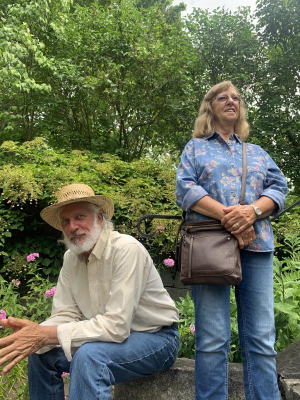 Wiscasset’s Steve and Carolyn Fife take in music in Sunken Garden during Schoonerfest in Wiscasset in August 2021. File photo