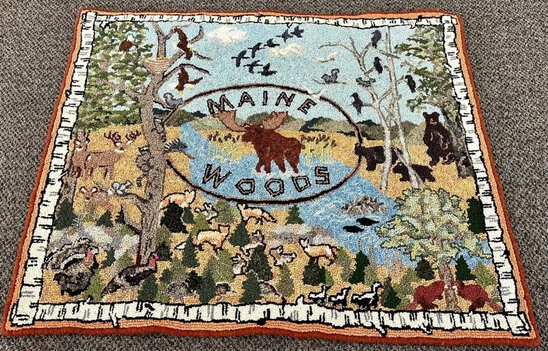 This outdoorsy-themed rug hooking is by Joan Dow, just one of the 23 Midcoast Fiber Artists in the May-June show at Southport Memorial Library. Courtesy of the artist Joan Dow