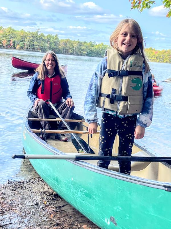 Lydia Crafts and daughter Kestrel canoe at Family Retreat. Courtesy of Hearty Roots