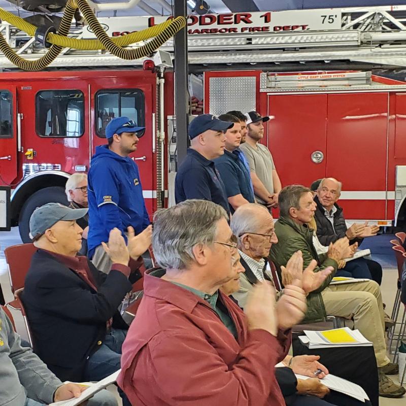 Members of Boothbay Harbor Fire Department receive applause after winning the Spirit of America award. FRITZ FREUDENBERGER/Boothbay Register