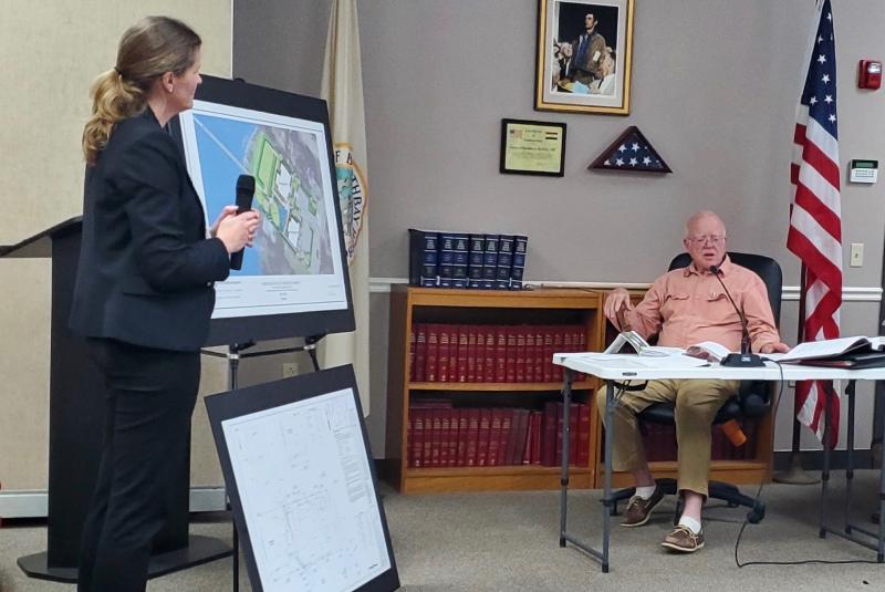 Architect Valery Tessier speaks with Boothbay Harbor planning board member Jon Dunsford about a proposed hotel on Atlantic Avenue. FRITZ FREUDENBERGER/Boothbay Register