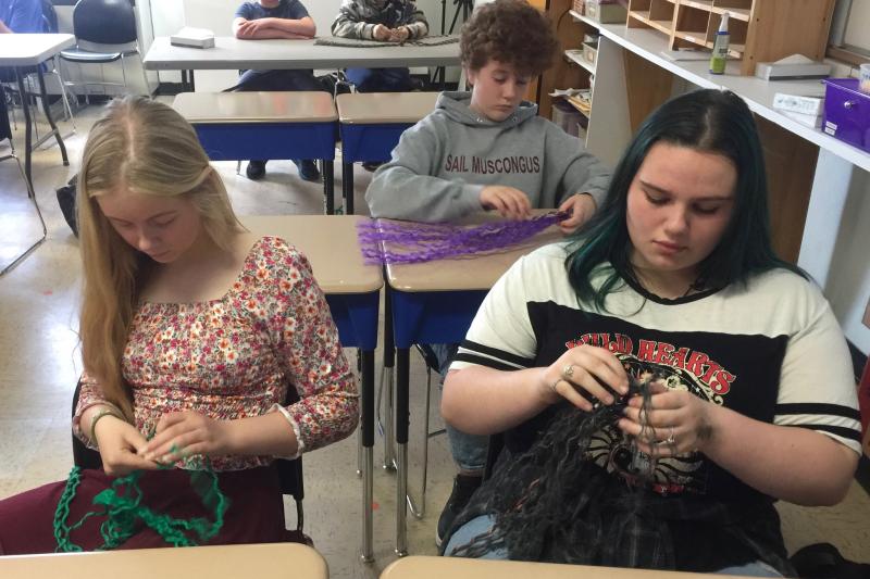 Alana LaCourse and Hayley Holbrook work on the BRES art project with Lucianne Jones in the background. FRITZ FREUDENBERGER/Boothbay Register