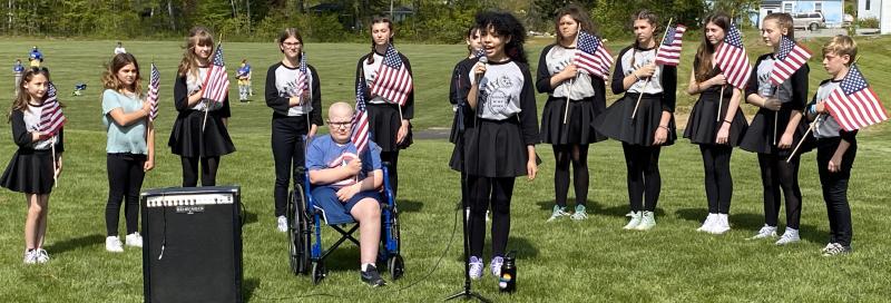 Y-Arts performed a song-and-dance routine May 26 during the Little League baseball field ribbon-cutting ceremony. Michelle Amero photo