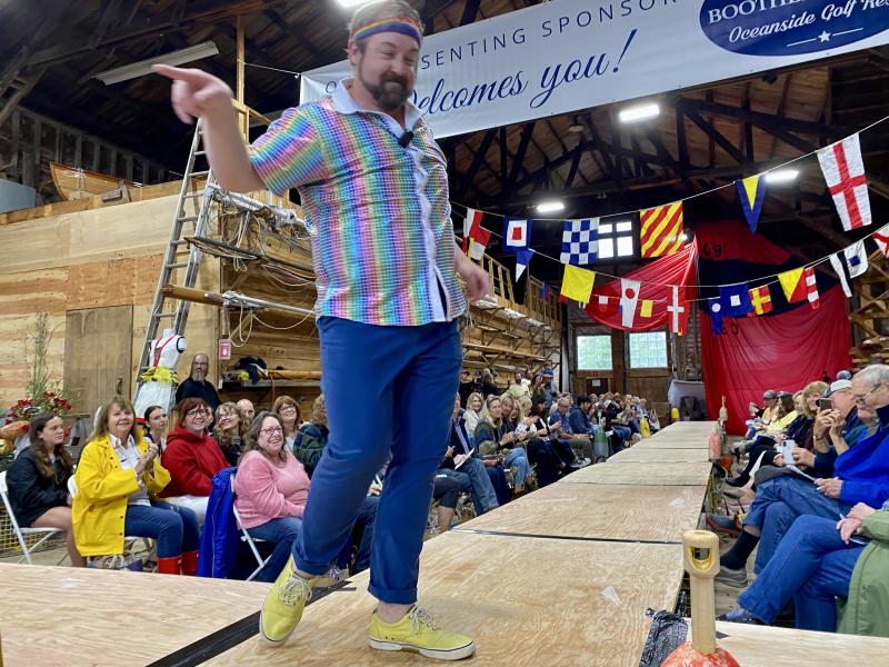 Host Michael Maxim hypes up the crowd. ISABELLE CURTIS/Boothbay Register