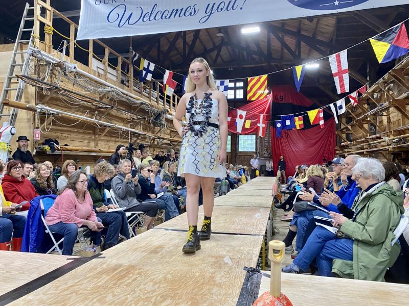 Charlee Fuchswanz dons a necklace of mussel shells and periwinkle with her outfit designed by Earl Brewer. ISABELLE CURTIS/Boothbay Register