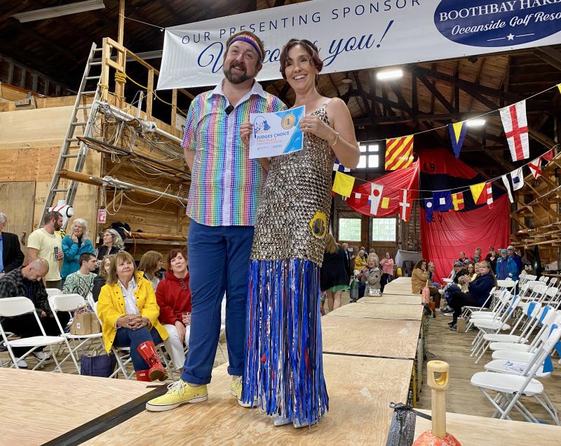 July Hasch, pictured with emcee Michael Maxim, wins both the Judge’s and People’s Choice award. ISABELLE CURTIS/Boothbay Register