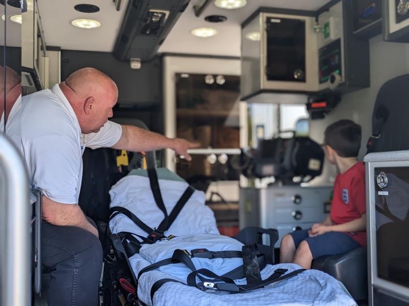 Aiden Nunan tours an ambulance. CANDI JONETH/Boothbay Register
