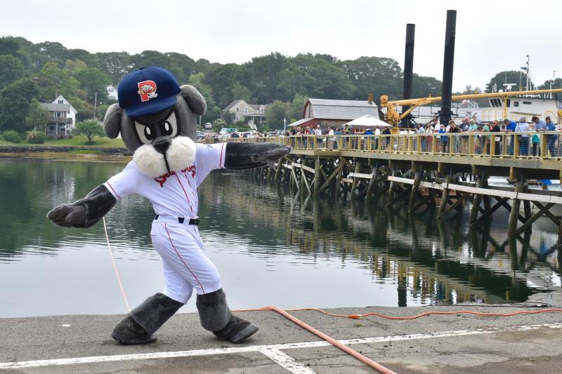 Slugger poses in front of the new Boothbay Harbor footbridge. FRITZ FREUDENBERGER/Boothbay Register