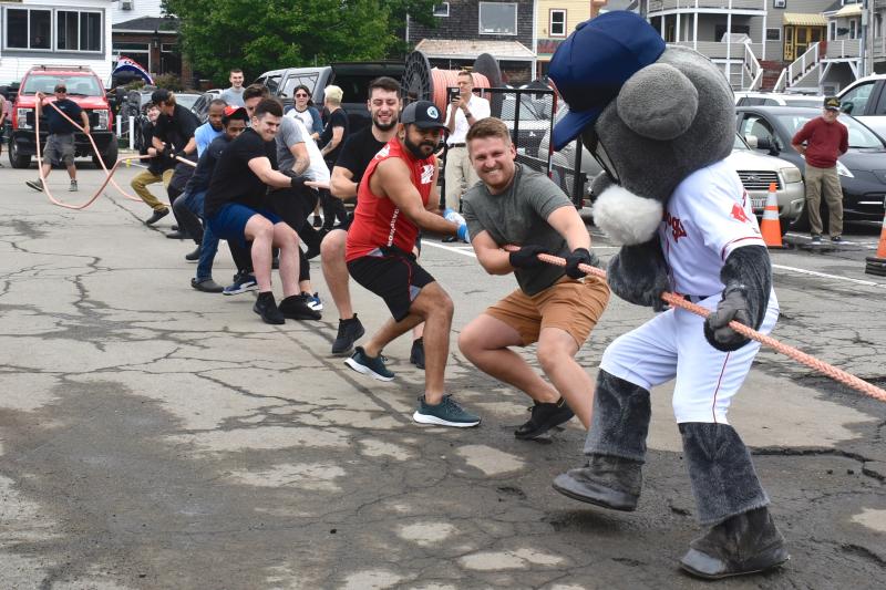 The Mine Oyster team gets a little help from Slugger, the Portland Sea Dog mascot. FRITZ FREUDENBERGER/Boothbay Register