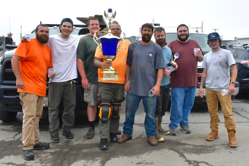 The winning team, from left to right: Jonathan Britt, Will Dryer, Austin Pooler, Todd Widdecomb, Albert Fogg, Walter Hezik, Riley (last name unknown) and Michael Gaudette. FRITZ FREUDENBERGER/Boothbay Register