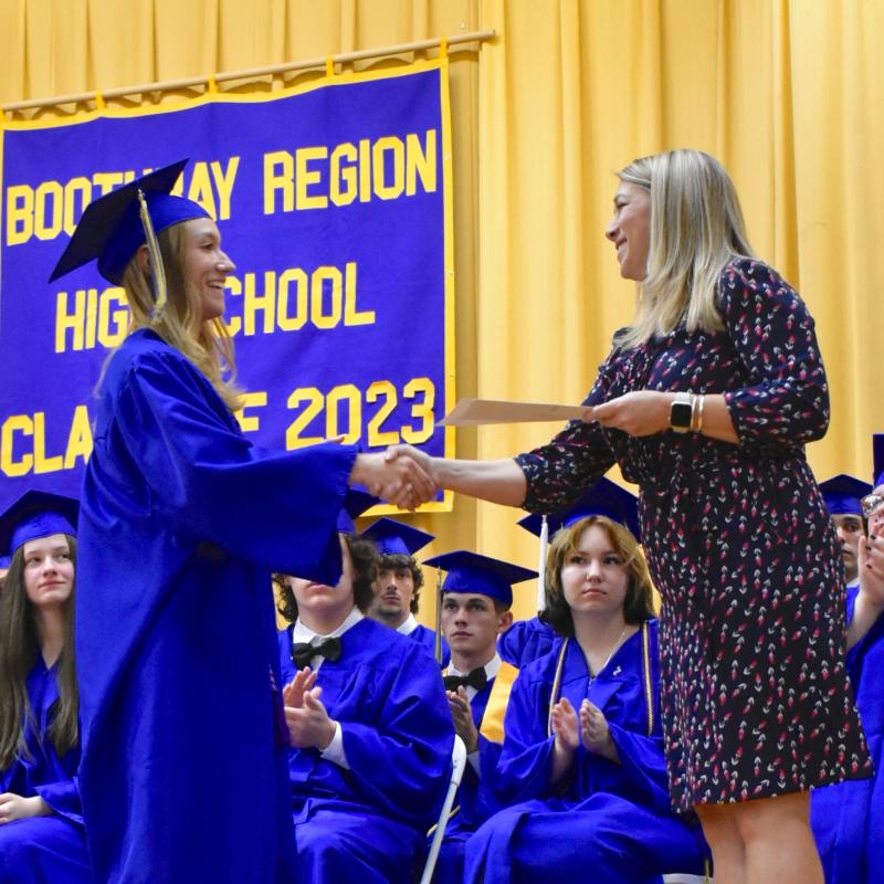 Meghan Leeman receives an award from Leanne Burnham. FRITZ FREUDENBERGER/Boothbay Register