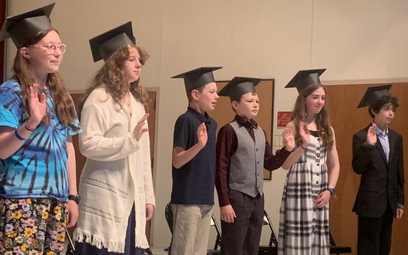 Edgecomb Eddy Class of 2023 members wave good-bye to elementary school June 22 during the sixth grade graduation ceremony. BILL PEARSON/Boothbay Register