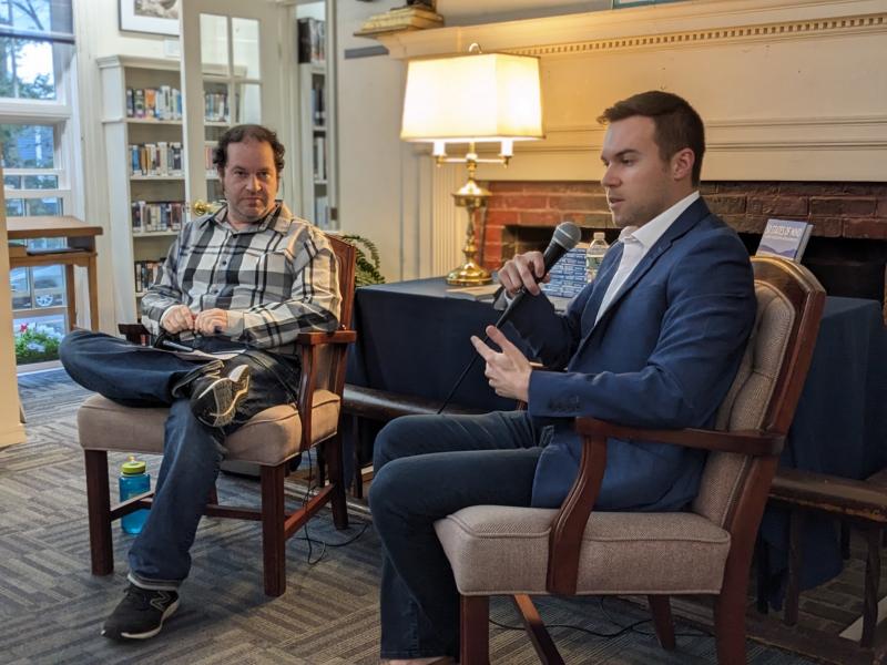 Moderator Eric Grossman, left, and author Ryan Bernsten at Boothbay Harbor Memorial Library take part in an author talk for “50 States of Mind: A Journey to Discover American Democracy.” CANDI JONETH/Boothbay Register