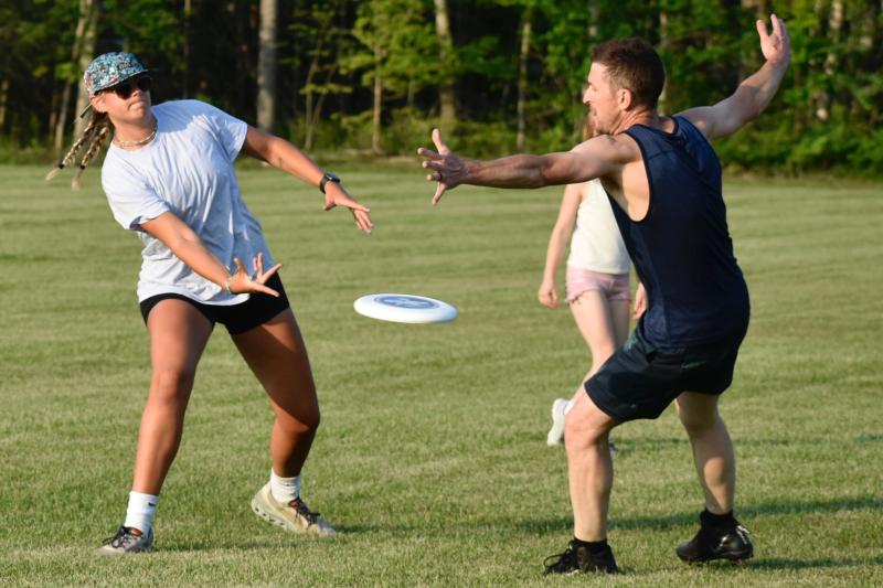 Aubrey Mitchell flings the Frisbee past Ralph Royle. FRITZ FREUDENBERGER/Boothbay Register