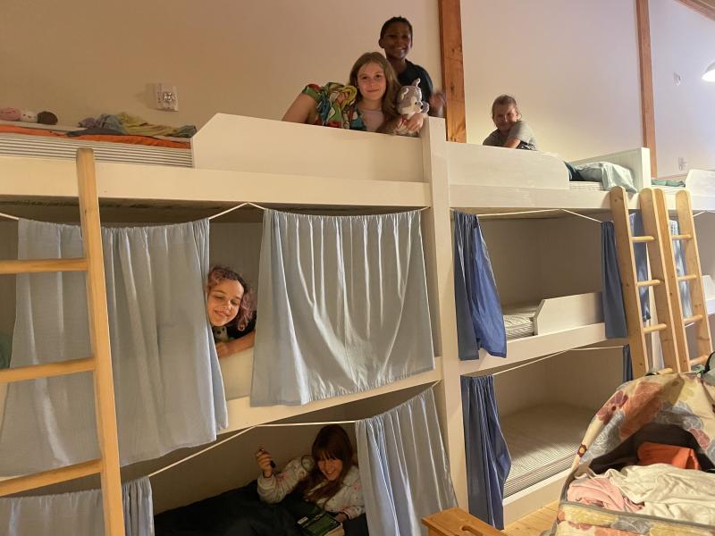 Bunk neighbors: top, Isabella Page, Clara Mundy and Evelyn Lessner; middle, Kinsley Weiss; bottom, Hattie Tomko. Courtesy photo