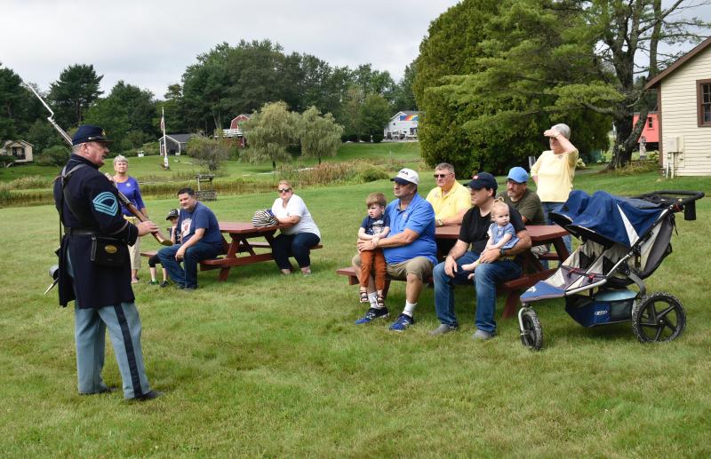 Robert Pierce explains military drills and demonstrations to Railway Museum visitors. FRITZ FREUDENBERGER/Boothbay Register