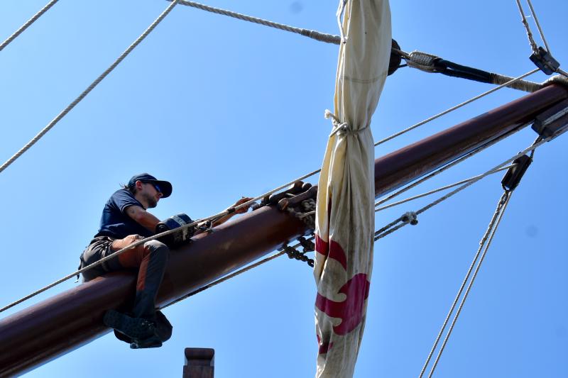 A crew member performs maintenance on the ship’s bowsprit. FRITZ FREUDENBERGER/Boothbay Register